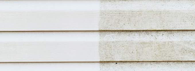 a wooden wall with one half dirty and the other half clean